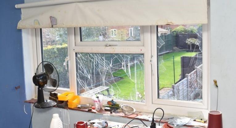 Window damaged by explosion in Sharnbrook