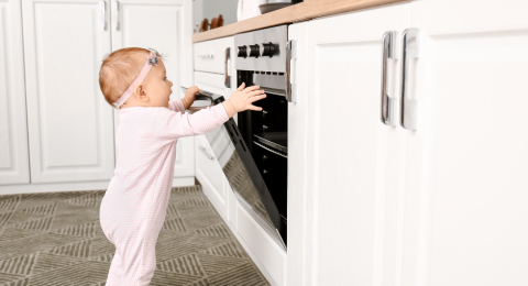 Child Playing with Oven